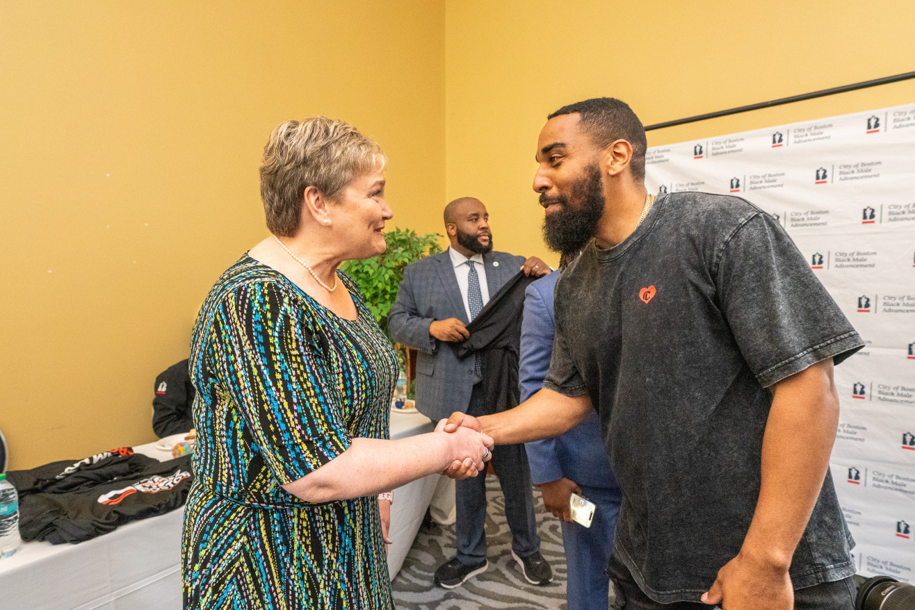 President Ross meets with a MBK Youth Summit speaker