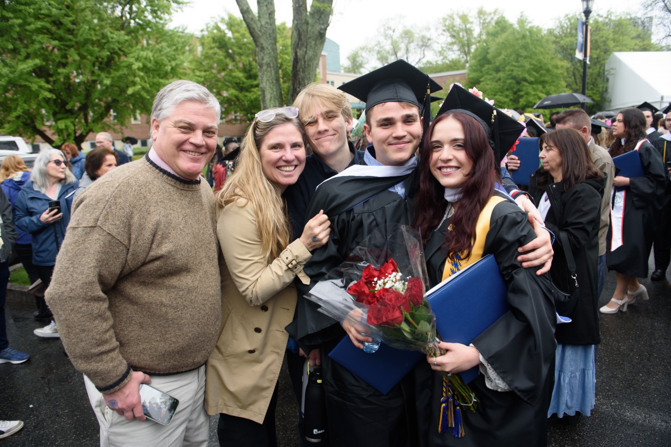 families and friends celebrate post-ceremony