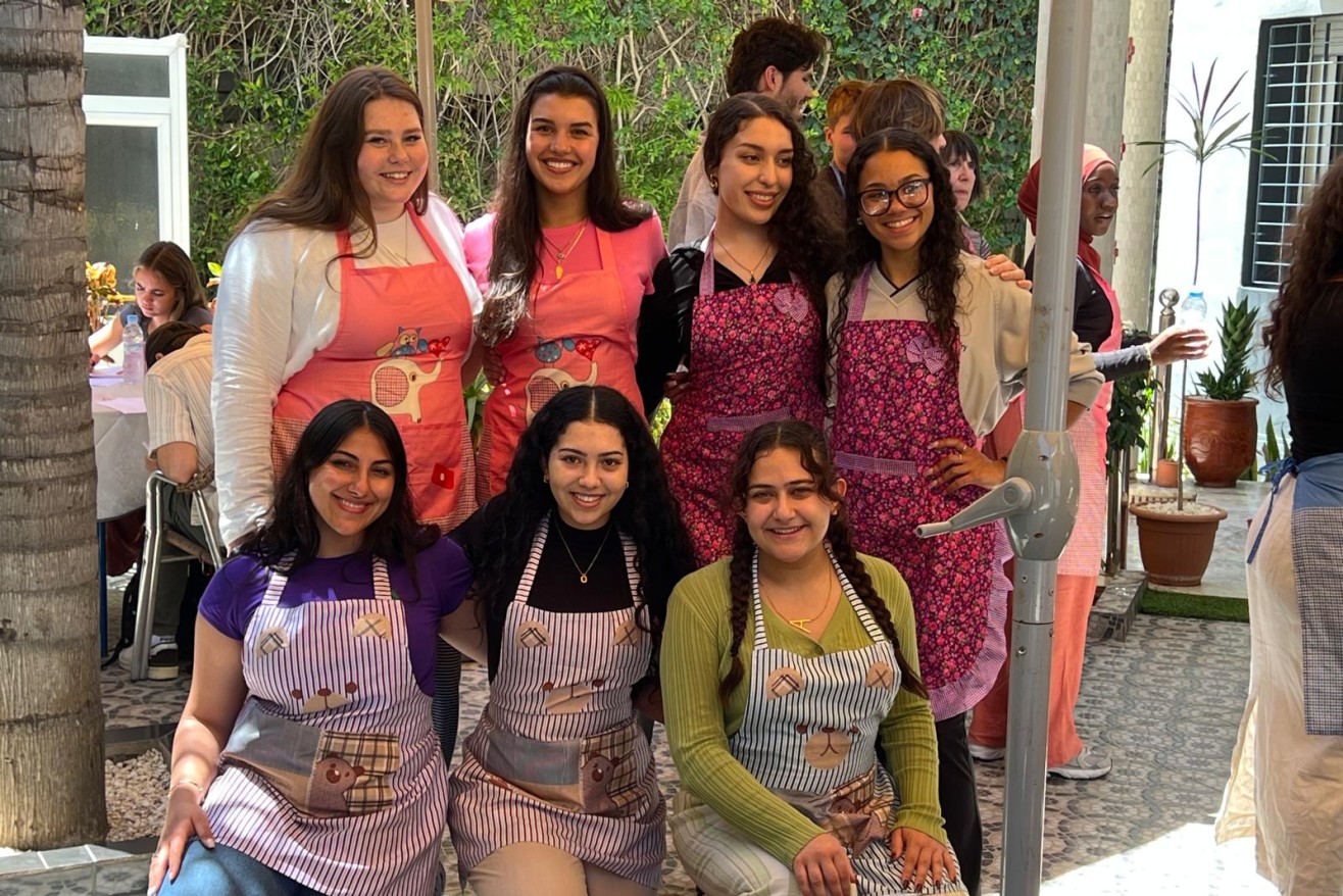 Morocco trip students in a courtyard in Morocco