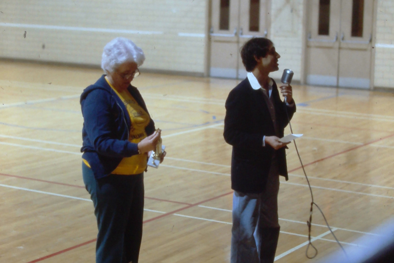 Andy speaks in Marian Hall gym